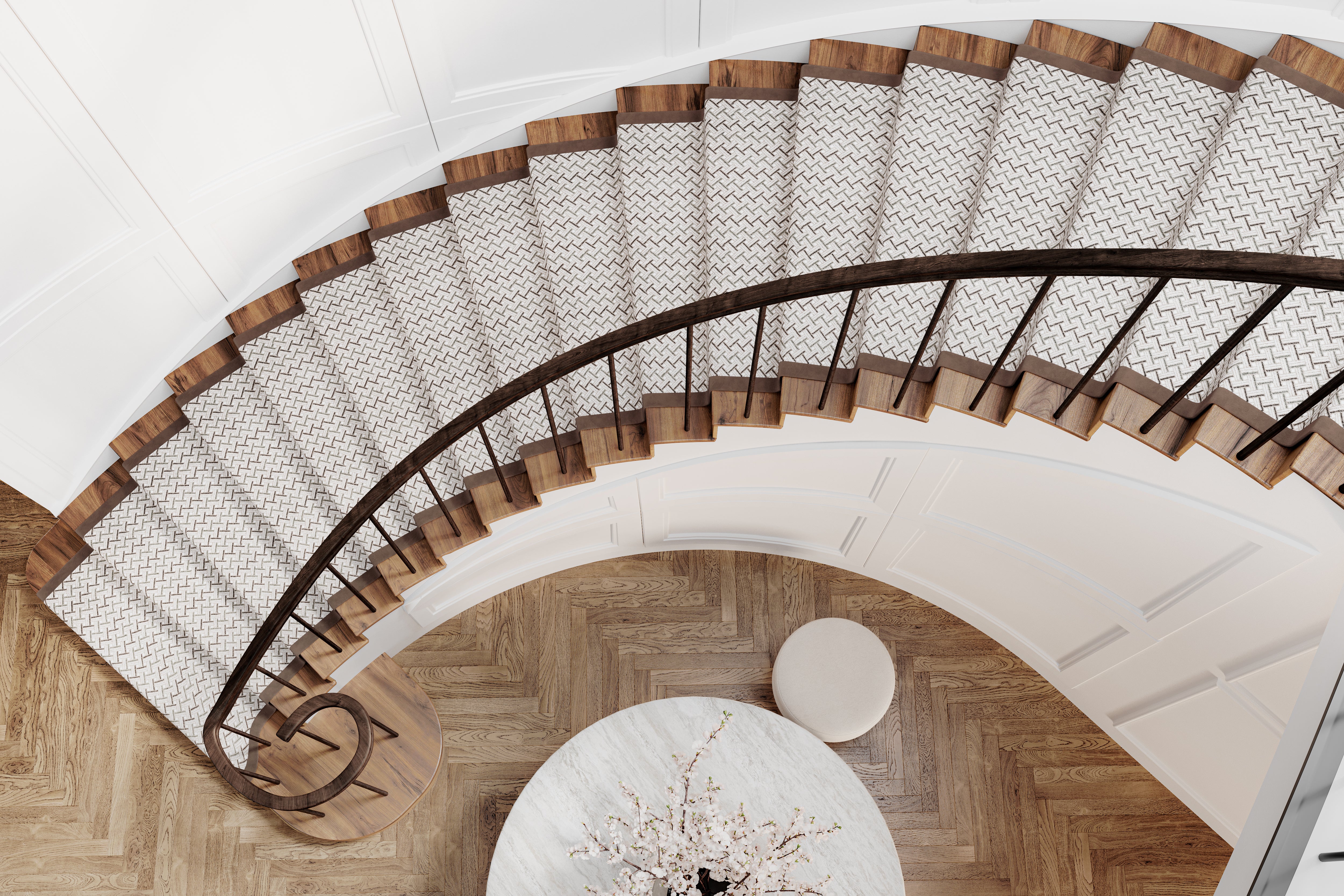 Winding staircase covered in premium carpet with text overlay in white: